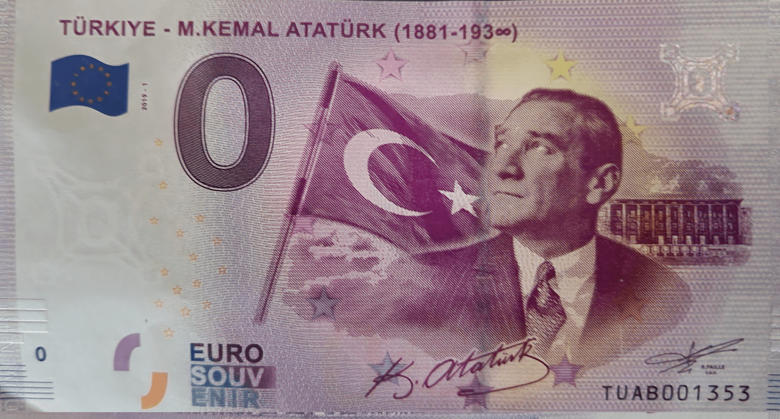 Close-up of a printed €0 Euro Souvenir banknote showing the serial number, holographic patch and fine engraving